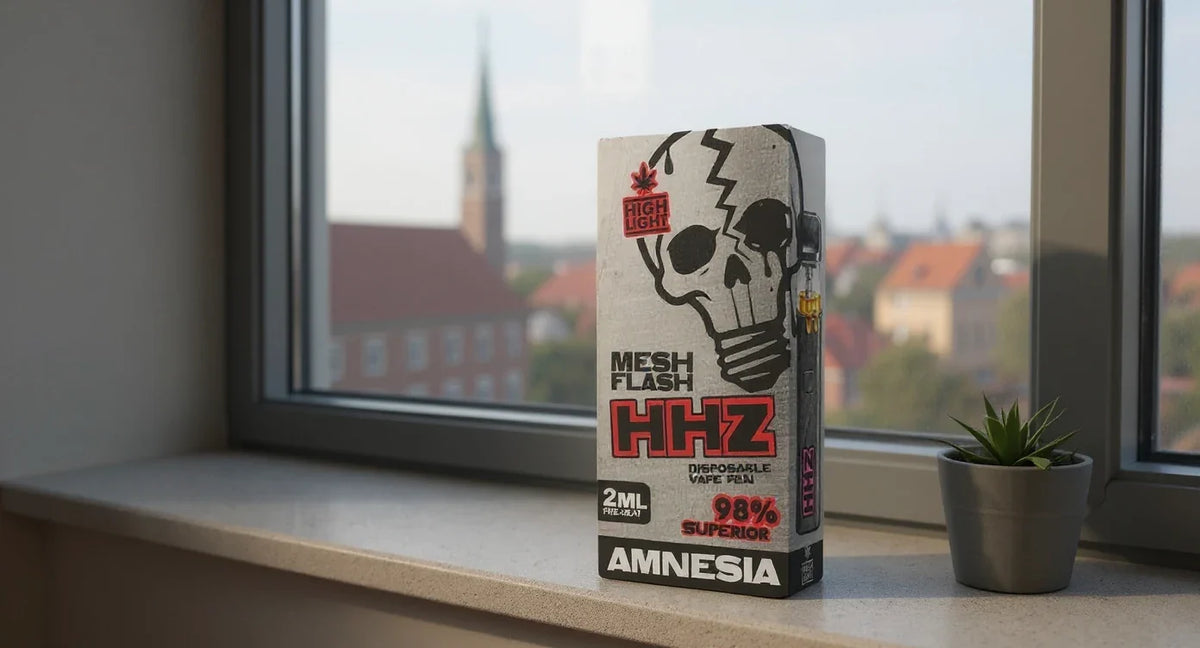 Mesh Flash Wirkung: Mesh Flash HHZ Vape Amnesia auf der Fensterbank mit Blick über die Dächer
